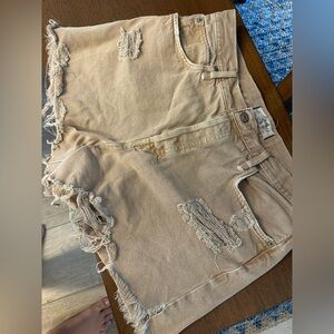 Free people distressed tan shorts